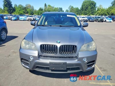 Piąte zdjęcie samochodu w środku: 2011 BMW X5 VIN:5UXZW0C55BL368543 - miniatura