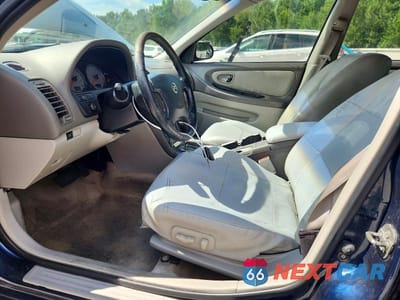 Zdjęcie 7 z 12 samochodu: 2002 NISSAN MAXIMA GXE VIN:JN1DA31D02T452844 - miniatura