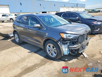 Czwarte zdjęcie samochodu z boku: 2019 FORD EDGE SEL VIN:2FMPK3J90KBB36021 - miniatura