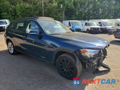Czwarte zdjęcie samochodu z boku: 2014 BMW X1 XDRIVE28I VIN:WBAVL1C55EVY10421 - miniatura
