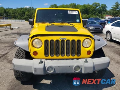 Piąte zdjęcie samochodu w środku: 2009 JEEP WRANGLER UNLIMITED X VIN:1J4GA39199L767716 - miniatura