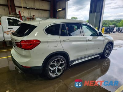 Trzecie zdjęcie samochodu z tyłu: 2017 BMW X1 XDRIVE28I VIN:WBXHT3C32H5F78977 - miniatura