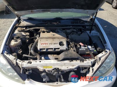 Zdjęcie 11 z 12 samochodu: 2006 TOYOTA CAMRY LE V6 VIN:4T1BF30KX6U626582 - miniatura
