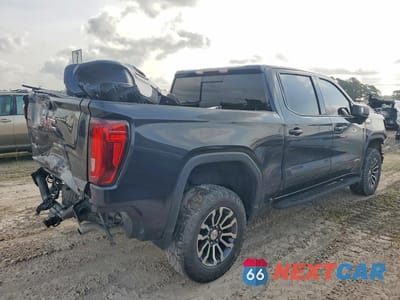 Trzecie zdjęcie samochodu z tyłu: 2022 GMC SIERRA K1500 AT4 VIN:1GTUUEET1NZ618999 - miniatura