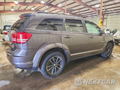 Trzecie zdjęcie samochodu z tyłu: 2017 DODGE JOURNEY SE VIN:3C4PDCAB9HT695663 - miniatura