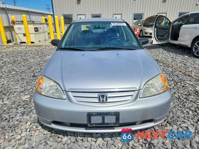 Piąte zdjęcie samochodu w środku: 2002 HONDA CIVIC LX VIN:1HGES16512L046626 - miniatura