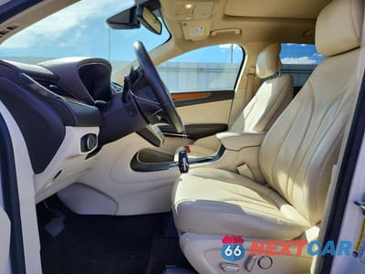 Zdjęcie 7 z 13 samochodu: 2015 LINCOLN MKC VIN:5LMCJ2A92FUJ30780 - miniatura