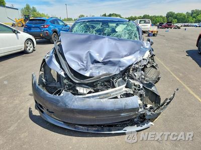 Piąte zdjęcie samochodu w środku: 2023 TESLA 3 VIN:5YJ3E1EA3PF474249 - miniatura