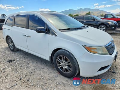 Czwarte zdjęcie samochodu z boku: 2011 HONDA ODYSSEY EXL VIN:5FNRL5H61BB096181 - miniatura