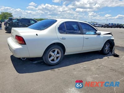 Trzecie zdjęcie samochodu z tyłu: 1999 NISSAN MAXIMA GXE VIN:JN1CA21D9XT215864 - miniatura