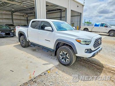 Czwarte zdjęcie samochodu z boku: 2021 TOYOTA TACOMA TRD OFF-ROAD VIN:5TFCZ5AN4MX244399 - miniatura
