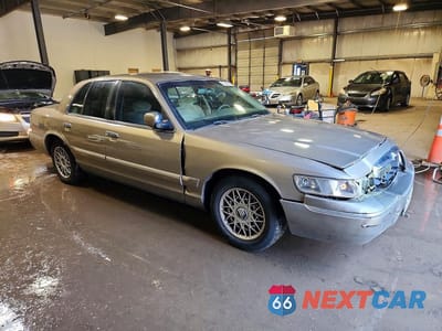 Czwarte zdjęcie samochodu z boku: 2002 MERCURY GRAND MARQUIS GS VIN:2MEFM74W02X664503 - miniatura
