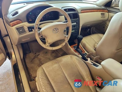Zdjęcie 8 z 12 samochodu: 2002 TOYOTA CAMRY SOLARA SLE V6 VIN:2T1CF28P02C590816 - miniatura
