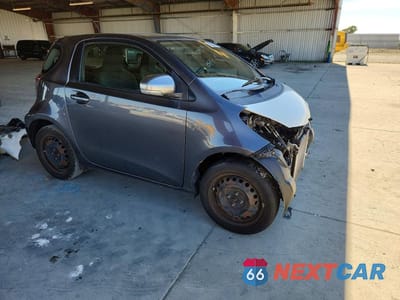 Czwarte zdjęcie samochodu z boku: 2012 SCION IQ BASE VIN:JTNJJXB00CJ014546 - miniatura