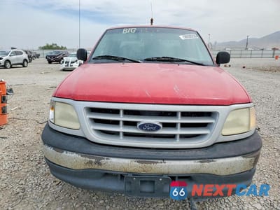 Piąte zdjęcie samochodu w środku: 1999 FORD F-150 VIN:1FTZX1724XNC04670 - miniatura