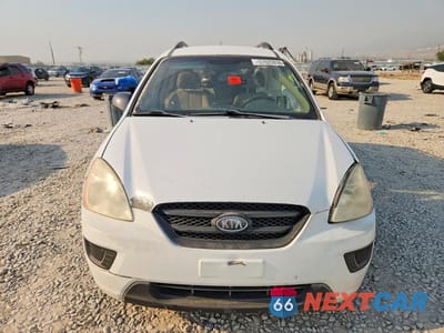 Piąte zdjęcie samochodu w środku: 2009 KIA RONDO BASE VIN:KNAFG529797279625 - miniatura