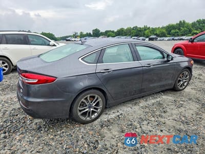 Trzecie zdjęcie samochodu z tyłu: 2019 FORD FUSION SEL FWD VIN:3FA6P0CD2KR219555 - miniatura