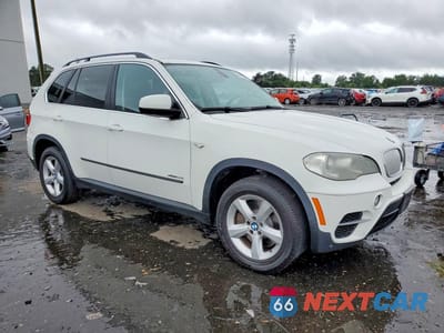 Czwarte zdjęcie samochodu z boku: 2012 BMW X5 XDRIVE50I VIN:5UXZV8C51CL422729 - miniatura