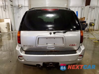 Zdjęcie 6 z 13 samochodu: 2006 GMC ENVOY DENALI VIN:1GKET63M162266787 - miniatura