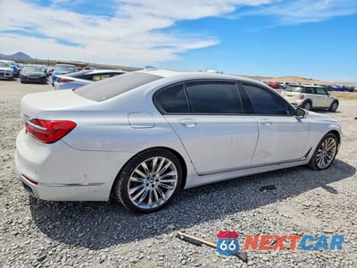 Trzecie zdjęcie samochodu z tyłu: 2016 BMW 750 XI VIN:WBA7F2C5XGG418922 - miniatura