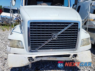 Zdjęcie 7 z 10 samochodu: 2012 VOLVO VNM DUMP TRUCK VIN:4V4MC9DF5CN553010 - miniatura