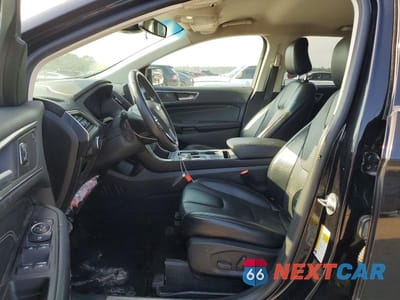 Zdjęcie 7 z 13 samochodu: 2022 FORD EDGE TITANIUM VIN:2FMPK4K9XNBA16266 - miniatura