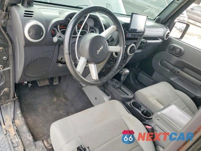 Zdjęcie 8 z 12 samochodu: 2008 JEEP WRANGLER UNLIMITED SAHARA VIN:1J8GA59148L542743 - miniatura