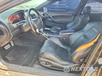 Zdjęcie 7 z 13 samochodu: 2006 PONTIAC GTO VIN:6G2VX12UX6L820026 - miniatura