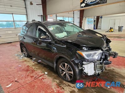 Czwarte zdjęcie samochodu z boku: 2018 TOYOTA RAV4 XLE VIN:2T3RFREV8JW783662 - miniatura