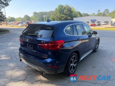 Czwarte zdjęcie samochodu z boku: 2017 BMW X1 SDRIVE28I VIN:WBXHU7C39H5H33108 - miniatura