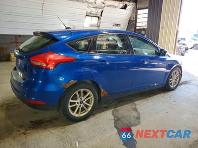 Trzecie zdjęcie samochodu z tyłu: 2018 FORD FOCUS SE VIN:1FADP3K21JL298061 - miniatura