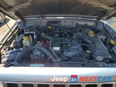Zdjęcie 12 z 13 samochodu: 1998 JEEP CHEROKEE SPORT VIN:1J4FJ68S9WL153722 - miniatura