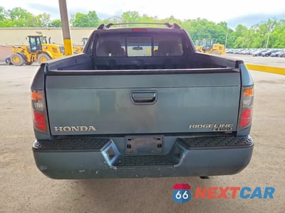 Zdjęcie 6 z 12 samochodu: 2006 HONDA RIDGELINE RTS VIN:2HJYK16456H520756 - miniatura