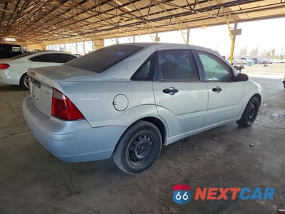 Trzecie zdjęcie samochodu z tyłu: 2006 FORD FOCUS ZX4 VIN:1FAFP34N76W120189 - miniatura