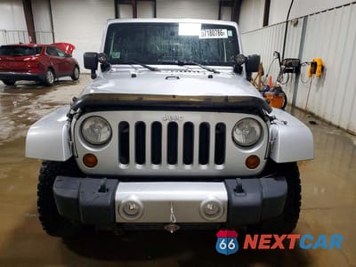 Piąte zdjęcie samochodu w środku: 2010 JEEP WRANGLER SAHARA VIN:1J4AA5D15AL214901 - miniatura