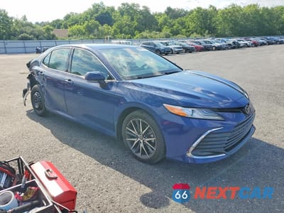 Czwarte zdjęcie samochodu z boku: 2024 TOYOTA CAMRY XLE VIN:4T1F11BKXRU109594 - miniatura