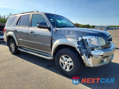 Czwarte zdjęcie samochodu z boku: 2004 TOYOTA SEQUOIA SR5 VIN:5TDBT44A34S205504 - miniatura
