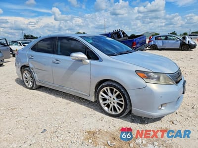 Czwarte zdjęcie samochodu z boku: 2010 LEXUS HS 250H PREMIUM VIN:JTHBB1BA5A2003415 - miniatura