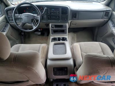 Zdjęcie 8 z 13 samochodu: 2005 GMC YUKON VIN:1GKEC13T05J164802 - miniatura