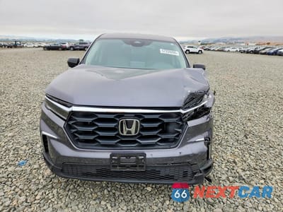 Piąte zdjęcie samochodu w środku: 2024 HONDA PILOT LX VIN:5FNYG2H28RB009284 - miniatura