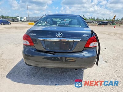 Zdjęcie 6 z 12 samochodu: 2011 TOYOTA YARIS BASE VIN:JTDBT4K34BL002107 - miniatura