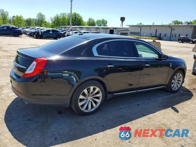 Trzecie zdjęcie samochodu z tyłu: 2016 LINCOLN MKS VIN:1LNHL9EK9GG603194 - miniatura