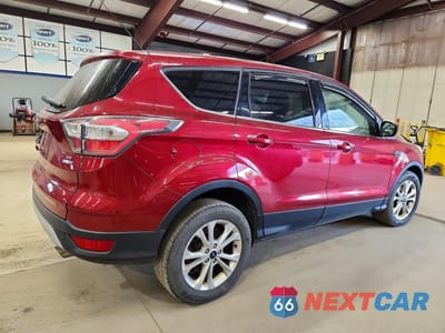 Trzecie zdjęcie samochodu z tyłu: 2017 FORD ESCAPE SE VIN:1FMCU9GDXHUA74301 - miniatura