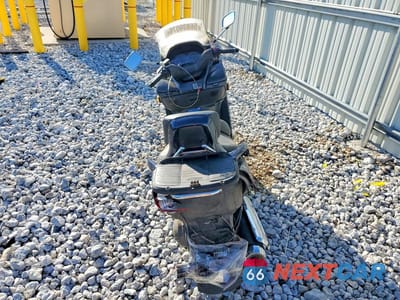 Czwarte zdjęcie samochodu z boku: 2003 SUZUKI AN400 K3 VIN:JS1CK43A332100566 - miniatura