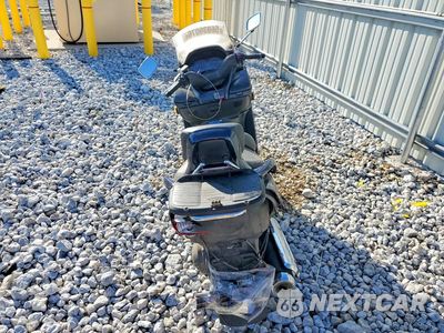 Czwarte zdjęcie samochodu z boku: 2003 SUZUKI AN400 K3 VIN:JS1CK43A332100566 - miniatura