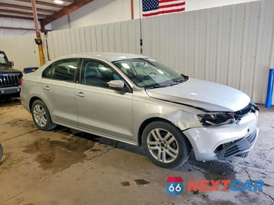 Czwarte zdjęcie samochodu z boku: 2012 VOLKSWAGEN JETTA SE VIN:3VWDP7AJXCM317764 - miniatura