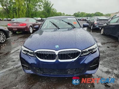 Piąte zdjęcie samochodu w środku: 2022 BMW 330XE VIN:WBA5P9C04NFM09489 - miniatura