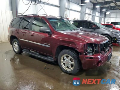 Czwarte zdjęcie samochodu z boku: 2006 GMC ENVOY VIN:1GKDS13S162261394 - miniatura