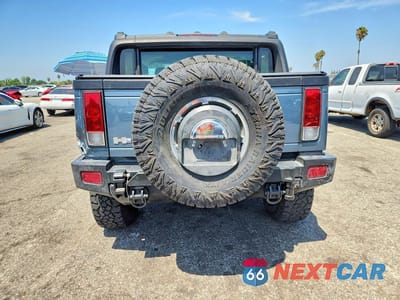 Zdjęcie 6 z 13 samochodu: 2005 HUMMER H2 SUT VIN:5GRGN22U95H115893 - miniatura