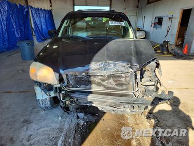 Piąte zdjęcie samochodu w środku: 2004 MAZDA TRIBUTE ES VIN:4F2CZ96144KM25996 - miniatura